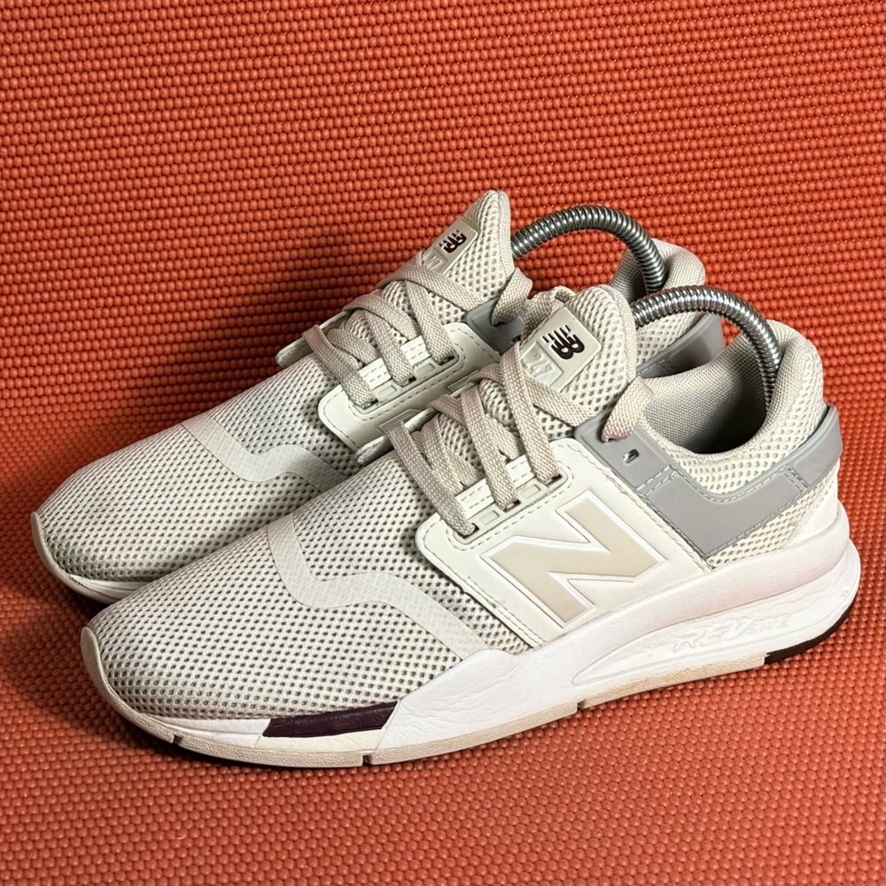 New Balance Cream Athletic Shoes with Sleek Design